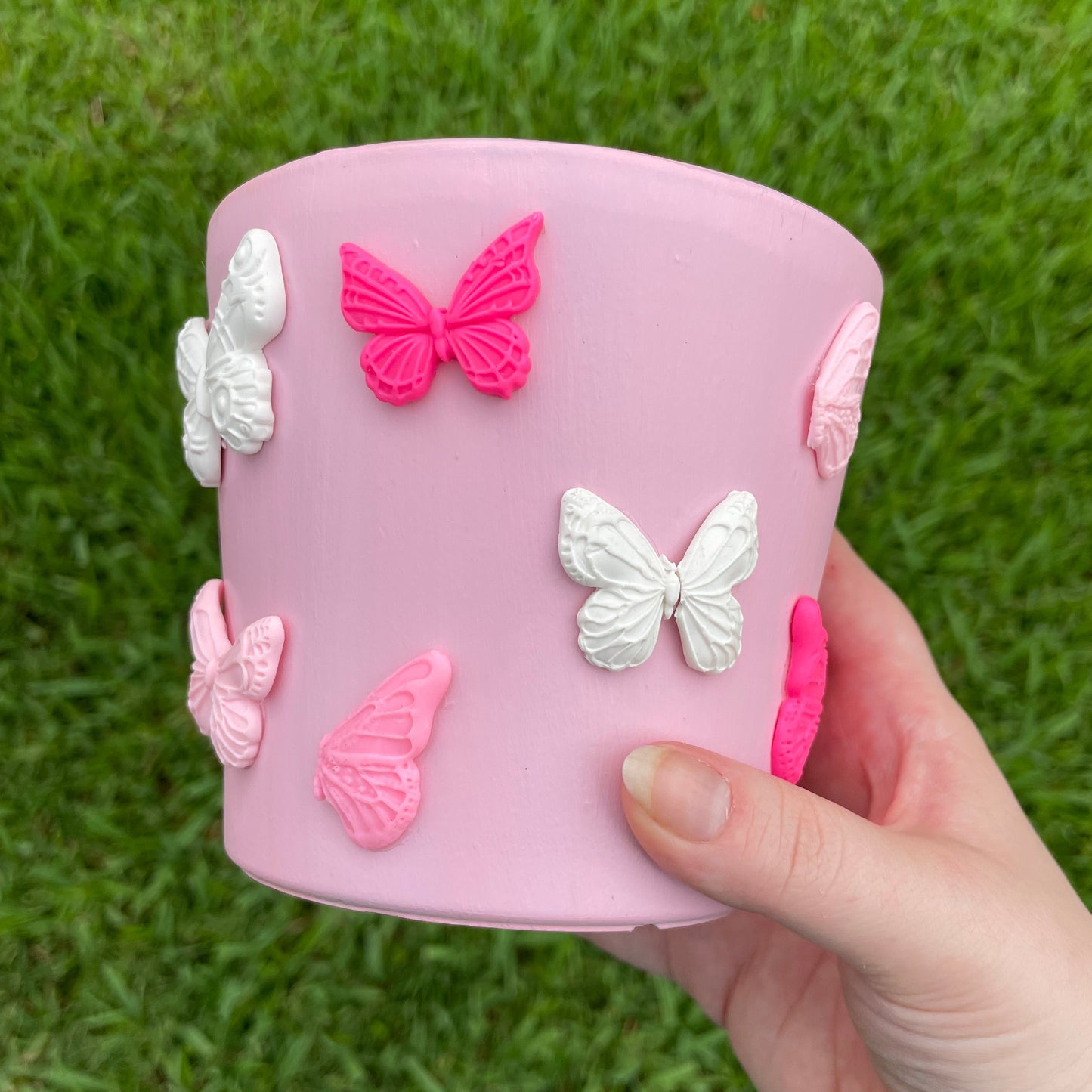 5-inch pink terracotta pot embellished with hand-painted designs and 3D clay butterflies.