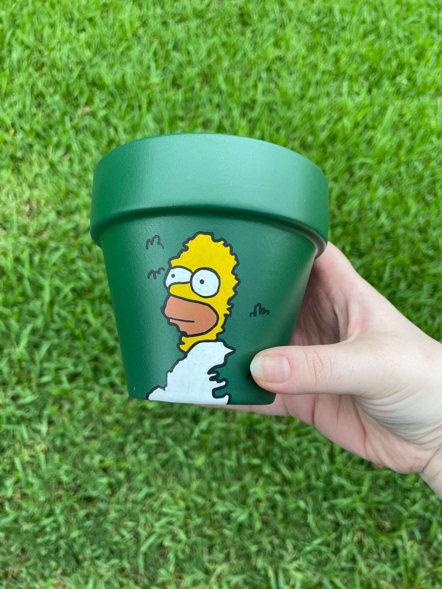 Homer Simpson in a Bush on a Flower Pot