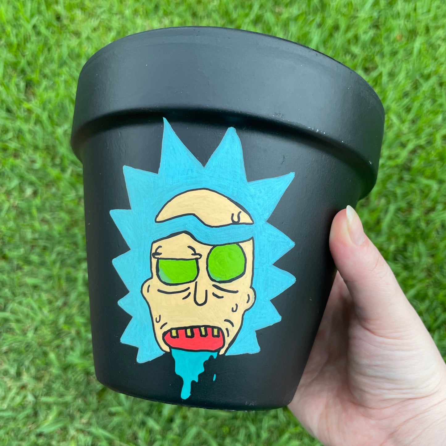 6.5-inch matte black terracotta pot featuring hand-painted Rick and Morty characters.